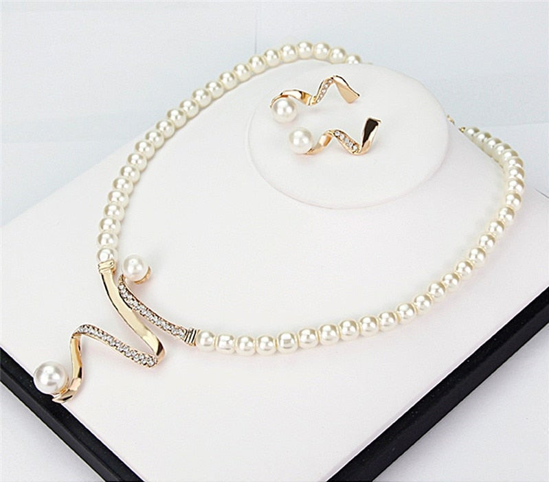 Emma™ | Earring and ring set with natural pearl and silver