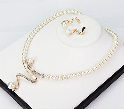 Emma™ | Earring and ring set with natural pearl and silver