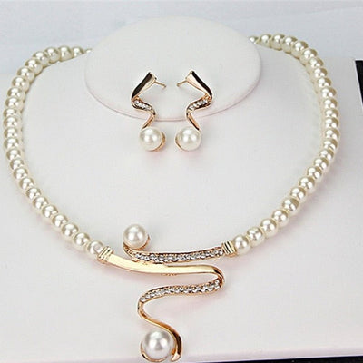 Emma™ | Earring and ring set with natural pearl and silver