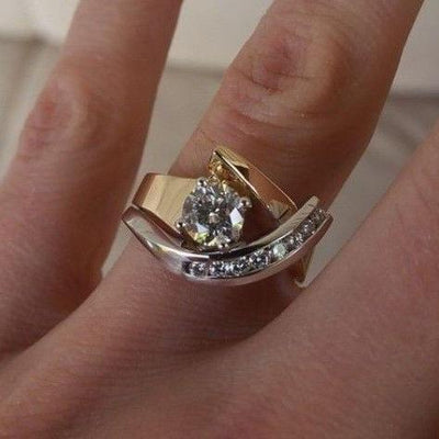 Emma™ | Irregular ring made of gold and silver with a zirconia