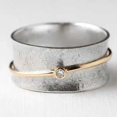 Emma™ | Silver ring with a line of gold and zirconia